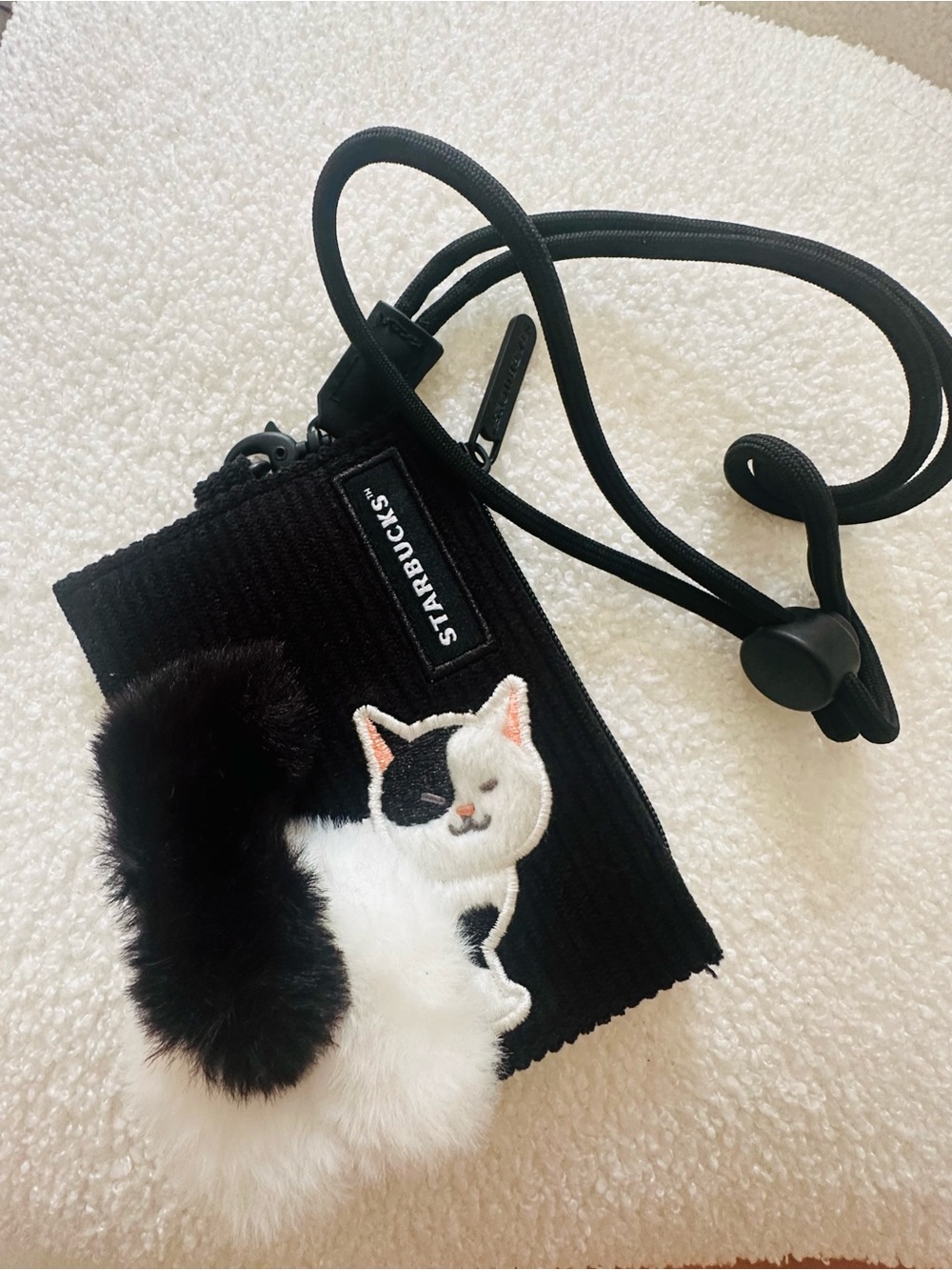 Starbucks Black Crossbody Bag with Plush Black-and-White Cat